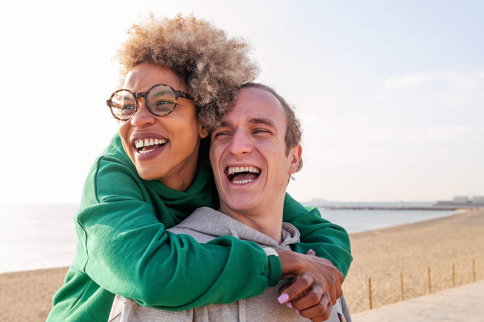 happy-young-couple-hugging-and-laughing-2022-11-07-23-32-47-utc.jpg